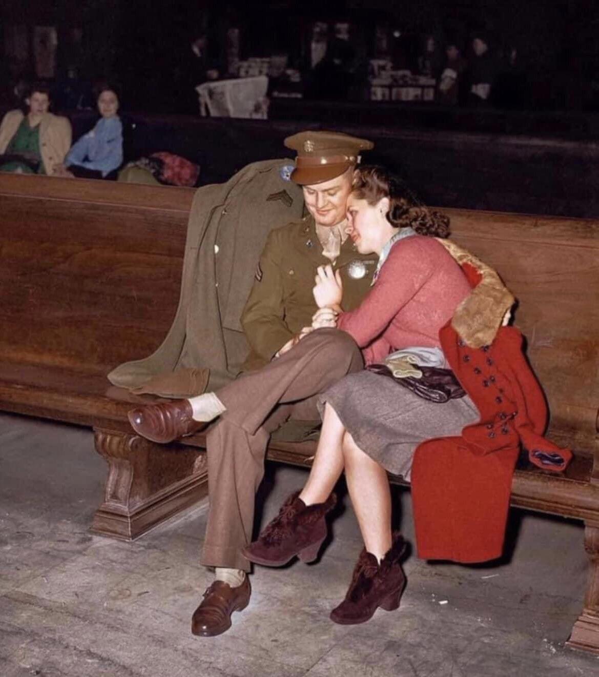 Timeless romance, just waiting for their train.