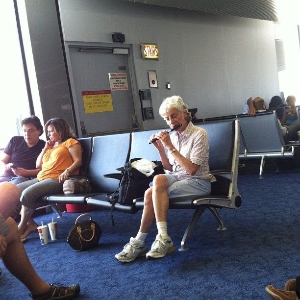 Grandma Flautist at the Airport