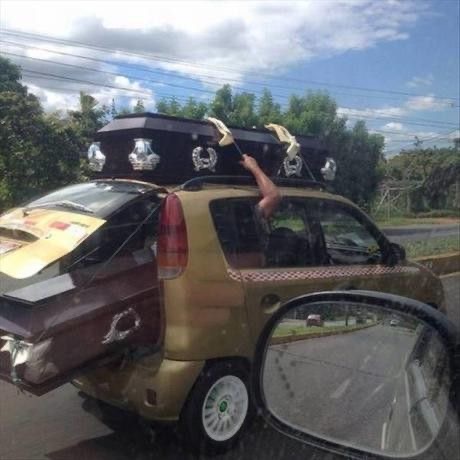 Tiny Car Carrying Coffins
