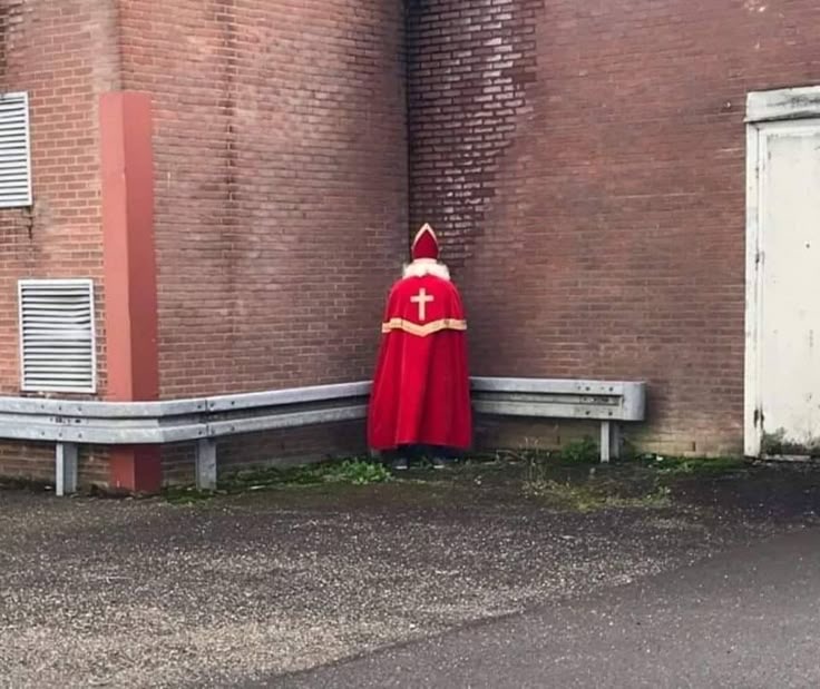 Priest Alone in Parking Lot