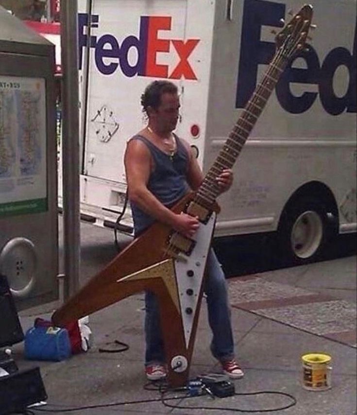 Man with Giant Guitar