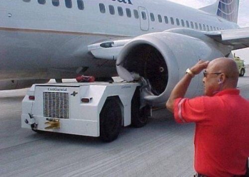 Plane Meets Pushback tug, Badly