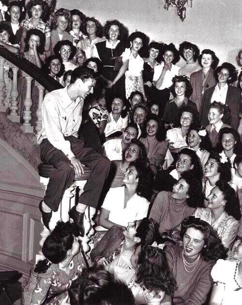 Frank on the Stairs, Surrounded by Girls
