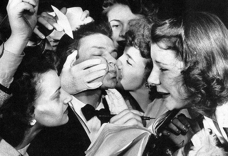 Girls Grab Him and Kiss Him