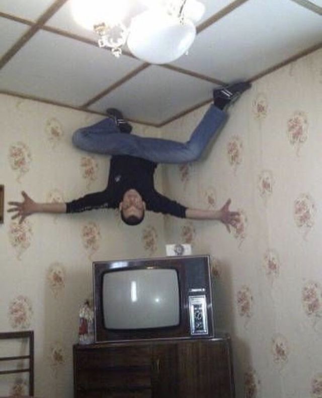 Man Crawling on Ceiling Like Spider-Man