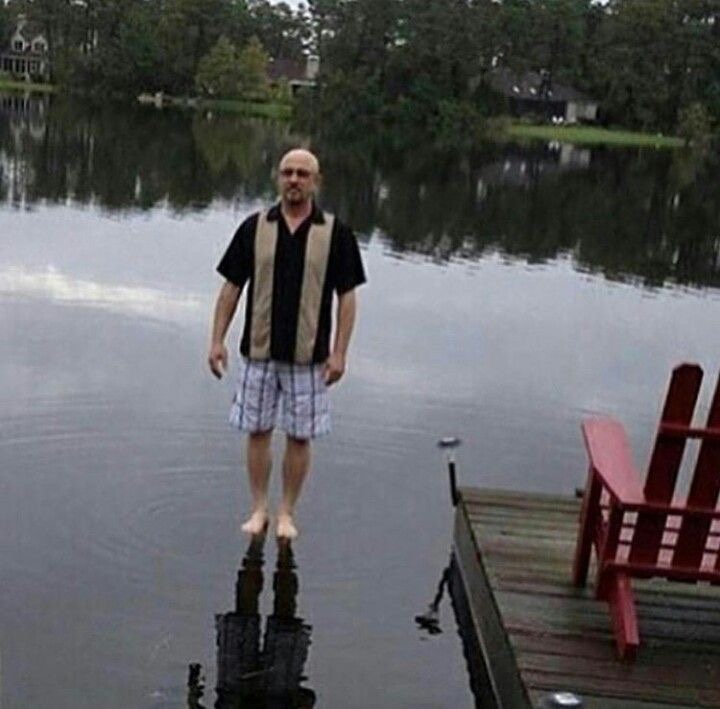 Man Floating Above Water