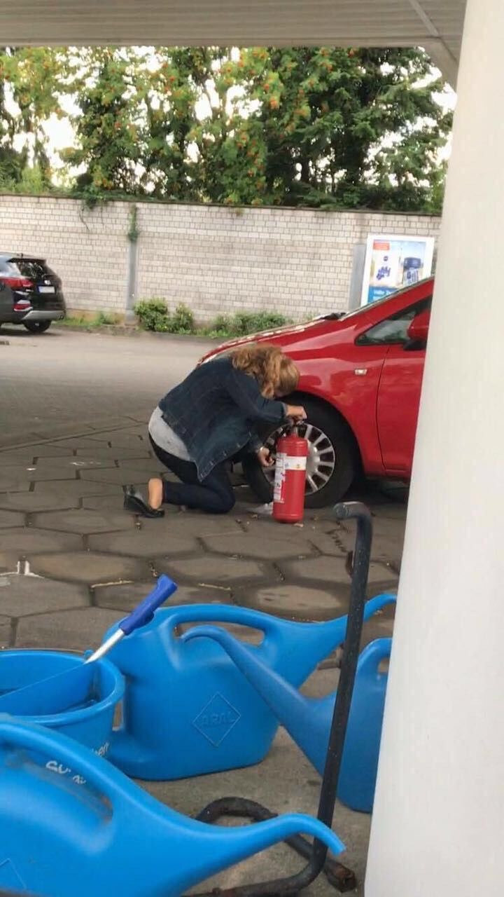 Woman Tries to Inflate Tire with Fire Extinguisher