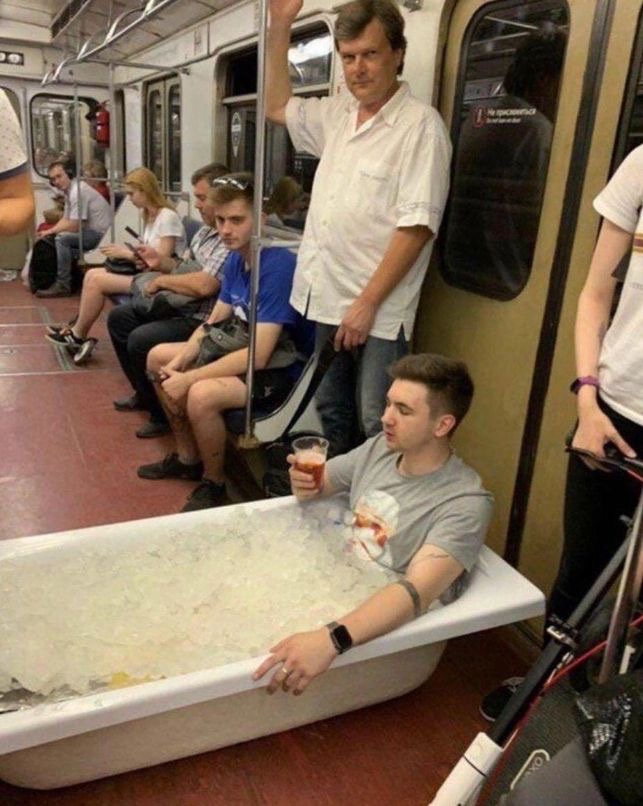 Guy Takes a Bathtub Full of Ice on the Subway
