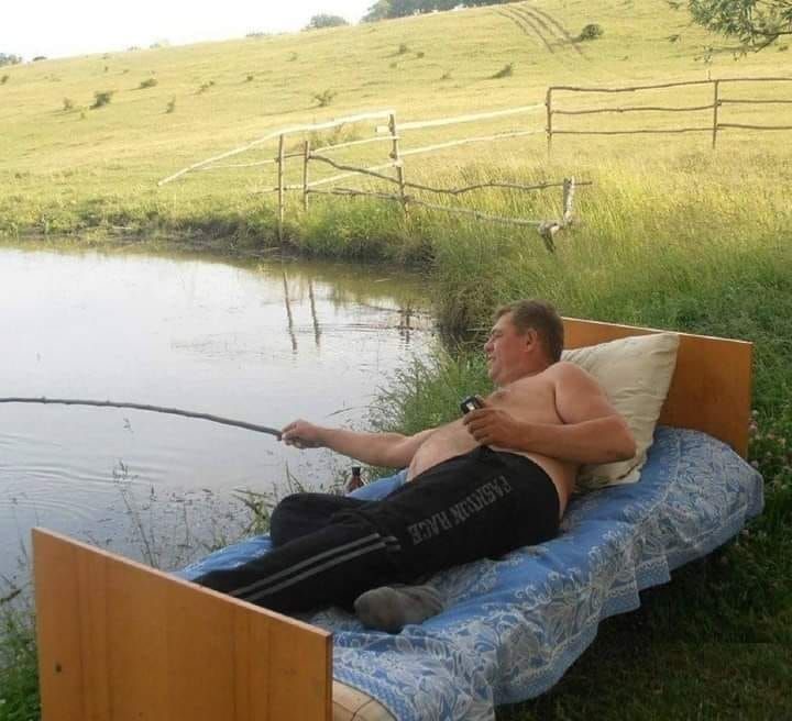 Man Fishing from Bedside