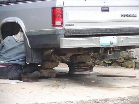 Truck Supported by Rocks During Repairs