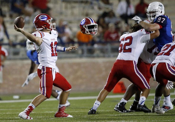 Football Player’s Helmet Goes Flying