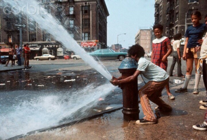 Children Playing with a Fire Hydrant