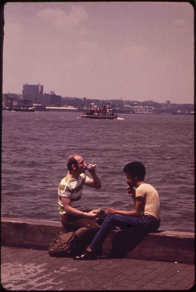 Men Drinking Beer by the River