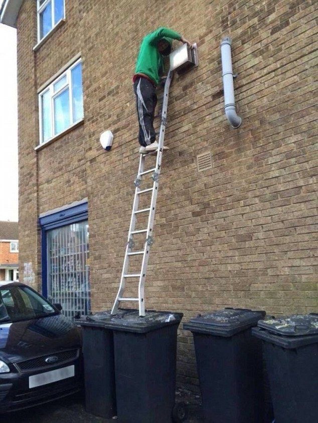 Ladder on Trash Can