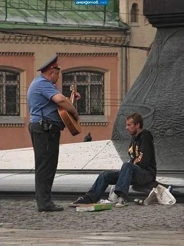 Cop With Guitar
