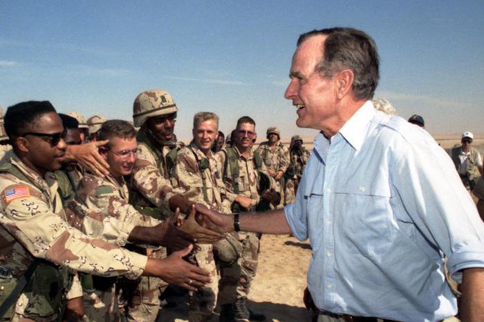 President George H. W. Bush visiting troops, 1990