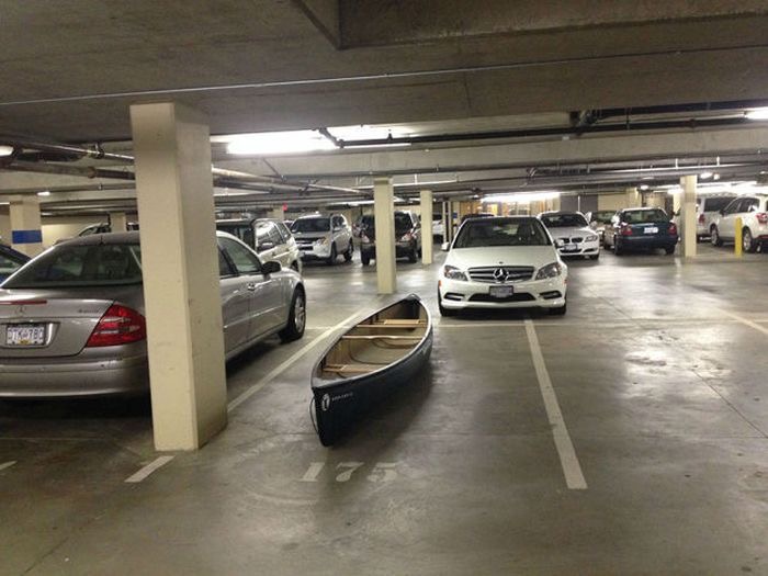 Boat in a Car Parking Lot