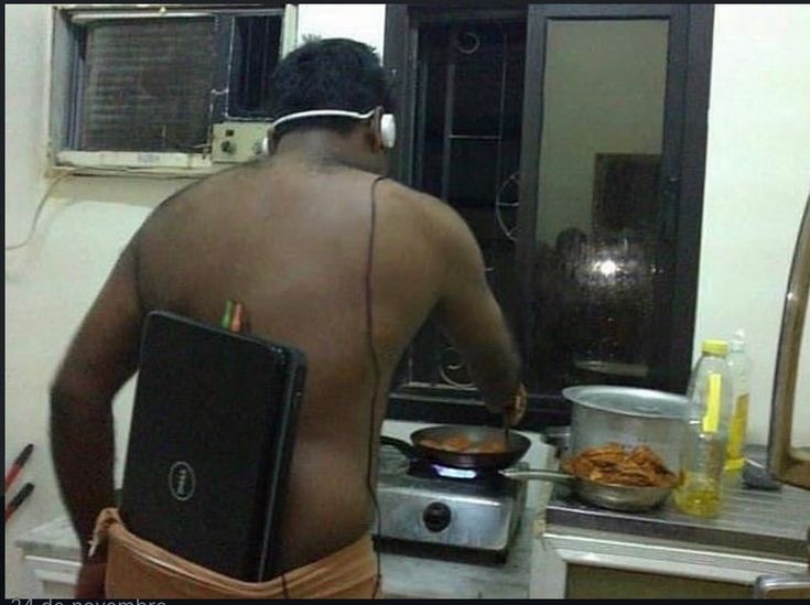 Wearing Headphones With His Laptop Stuffed in His Pants