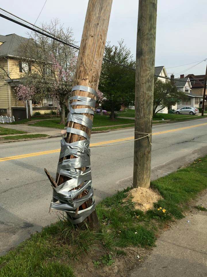 Light Pole Held Together by Tape