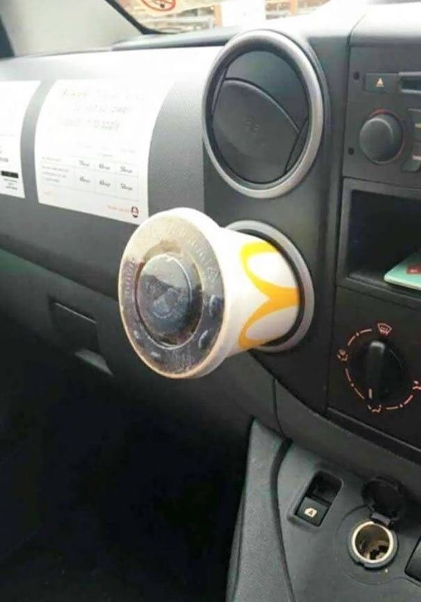 Car Air Vent Used as a Cup Holder