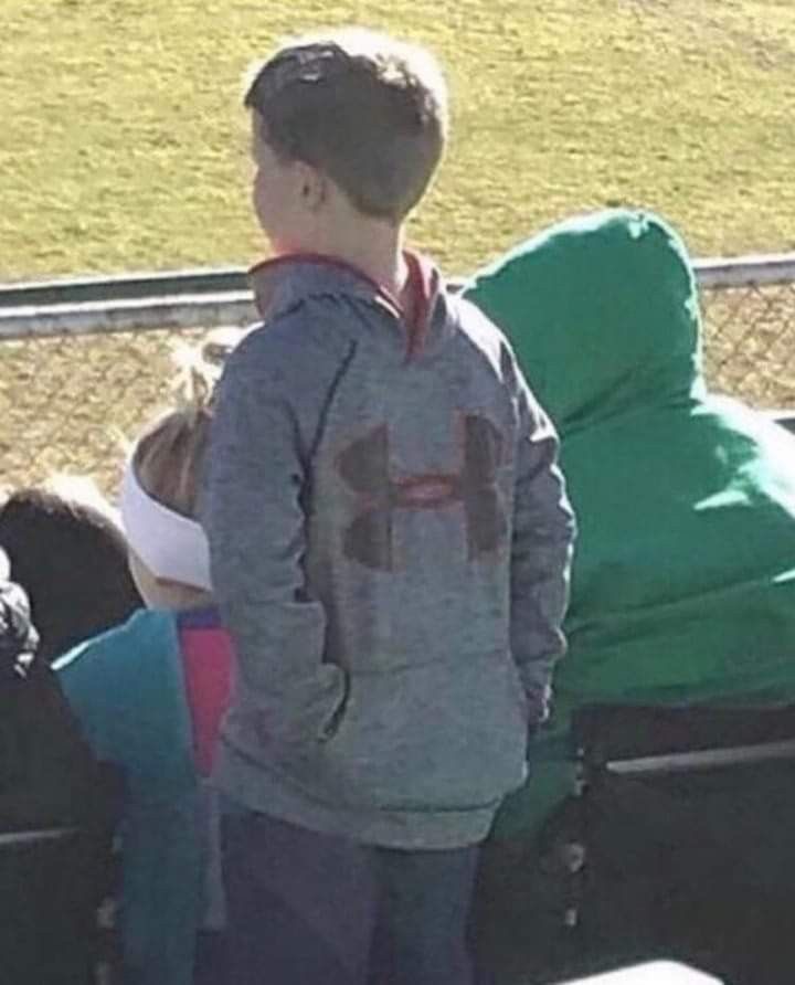 Kid Wearing His Hoodie Completely Backwards