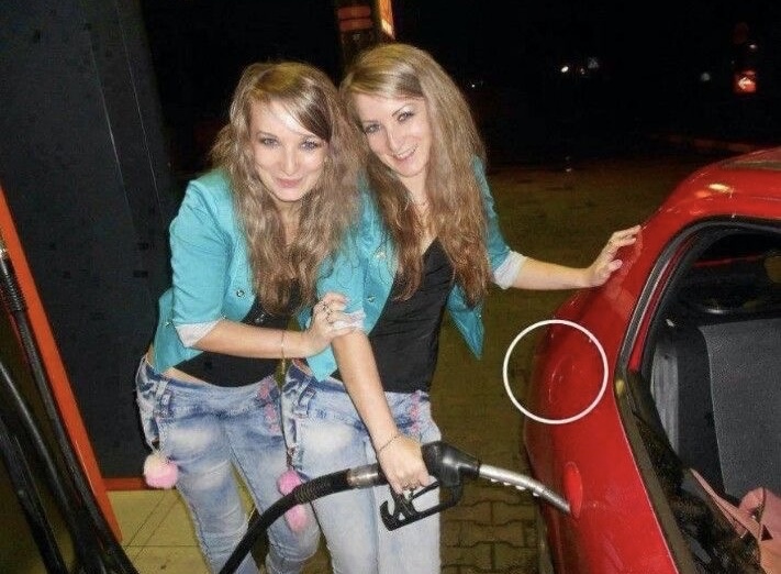 Women Trying to Fuel the Car Through the Door