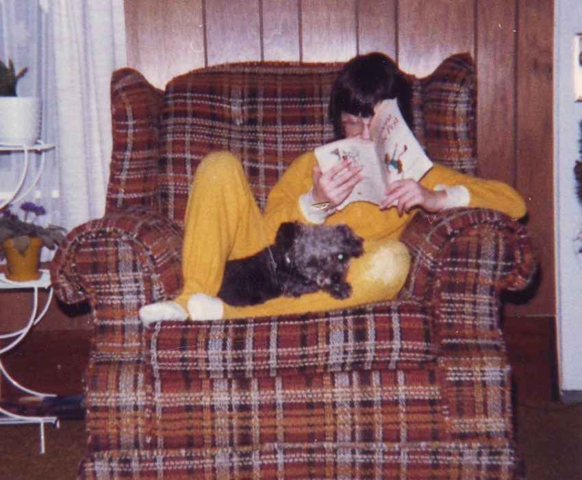 Nerd Kid Reading on the Couch With Loyal Dog Wingman