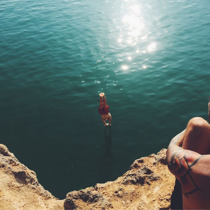 Boy About to Splash Into Water