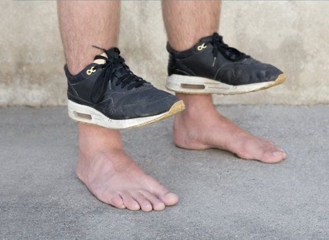 Boy Wearing Sneakers on His Ankles