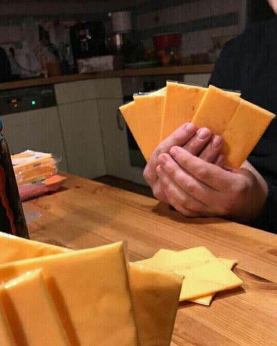 Card Game Played with Slices of Cheese