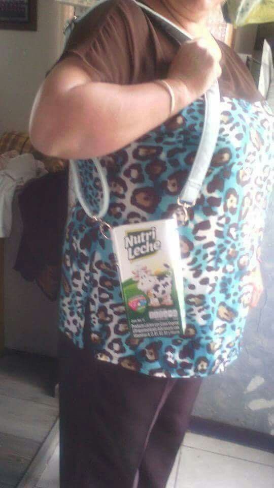 Woman Using a Milk Carton as a Purse