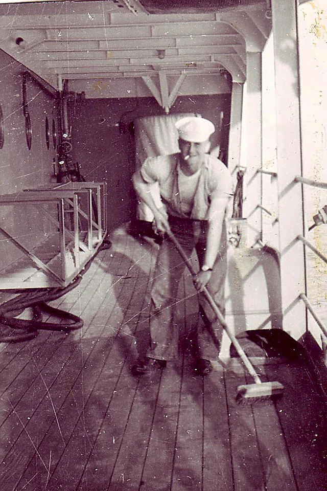 Washing down the ship deck