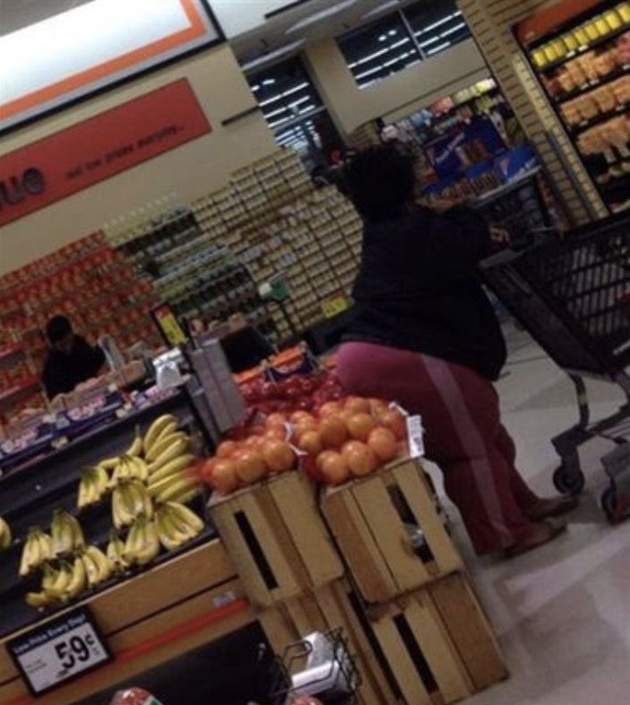 Woman Leaning on the Fruit