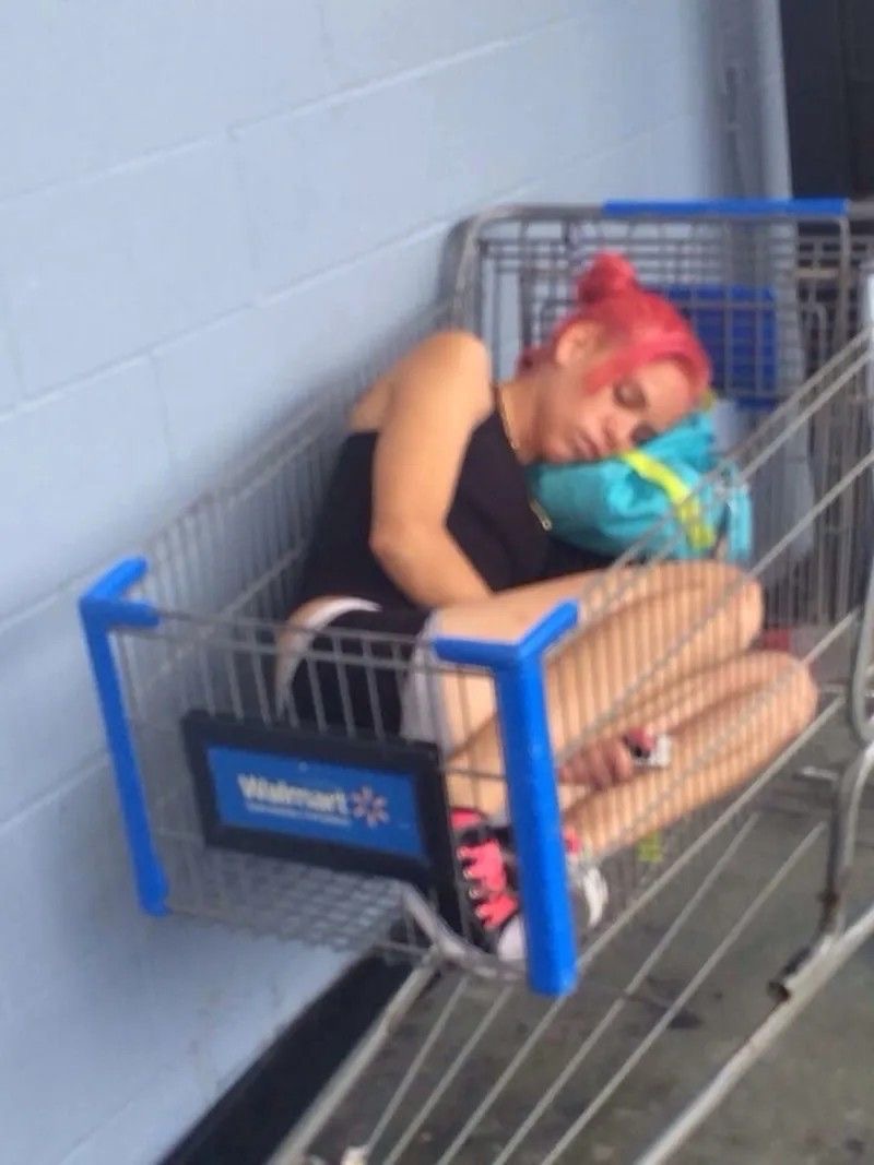 Girl Sleeping in Shopping Cart