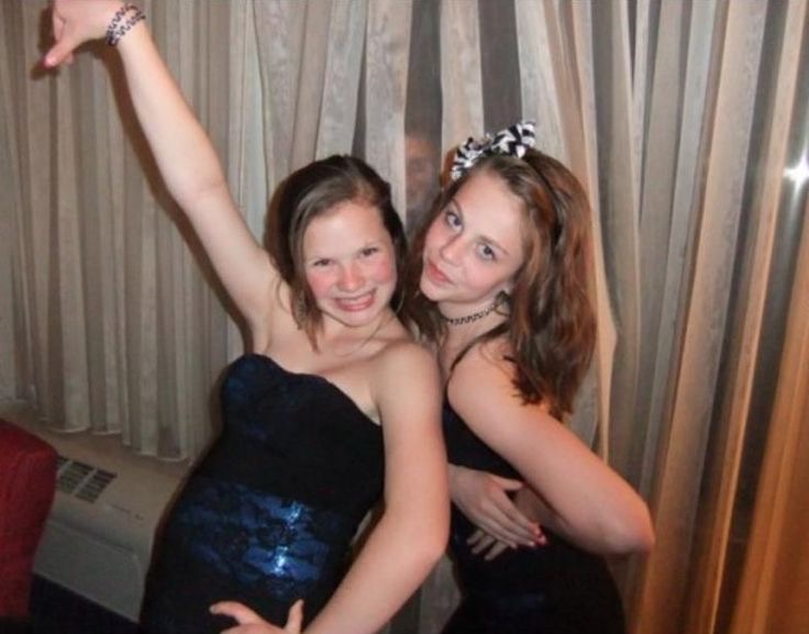 Girls Posing While a Man Stares