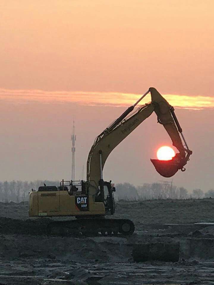 Crane Lifting the Sun