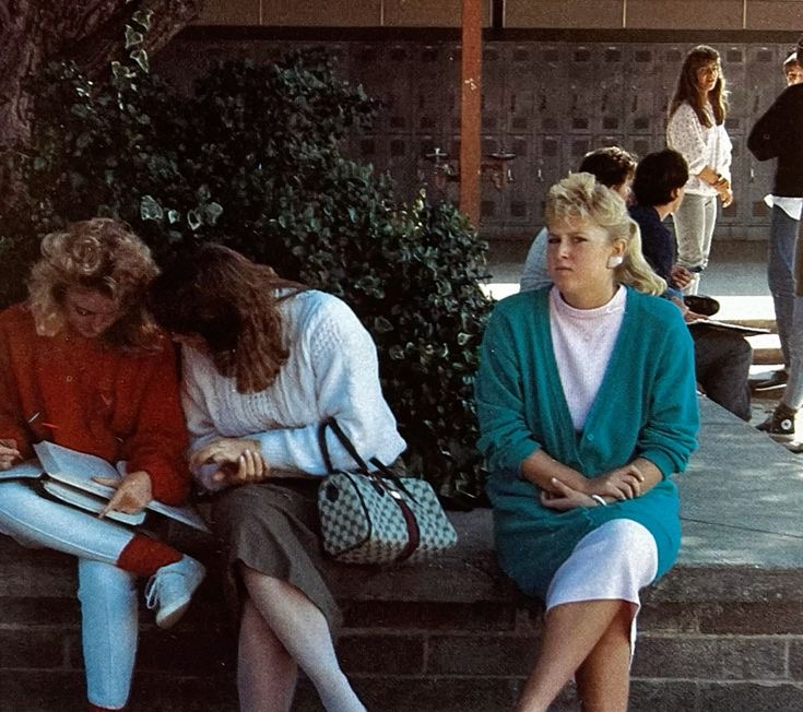 Girls Talking, One Left Out