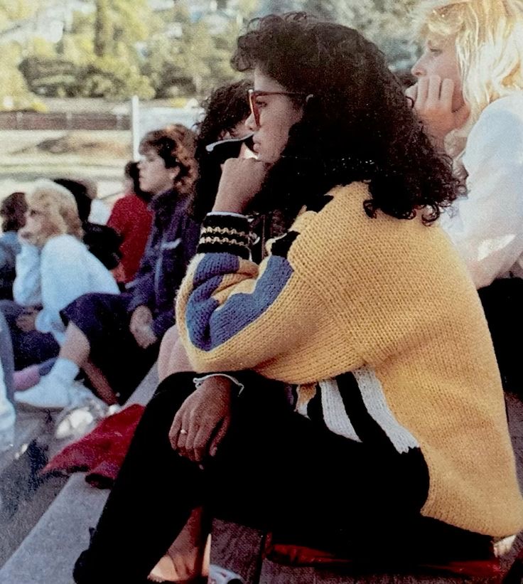 Nerdy Girl Watching the Game from the Bleachers
