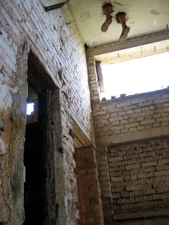 Man’s Feet Crash Straight Through the Ceiling