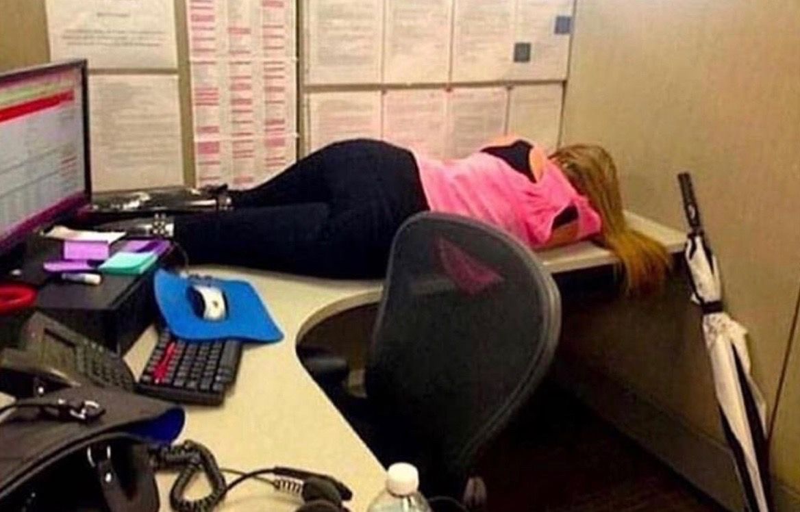 Woman Sleeping at Her Desk