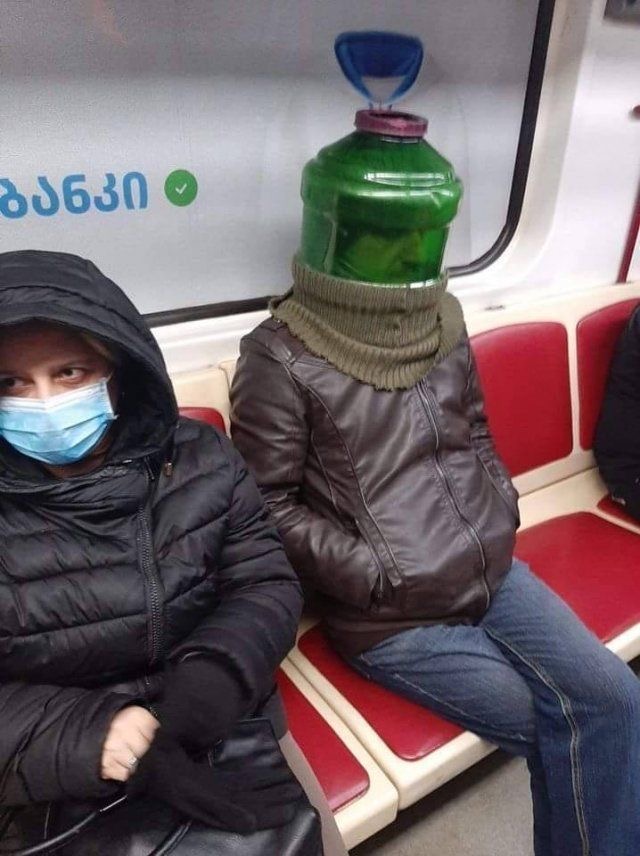 Man Wearing a Plastic Jug on His Head