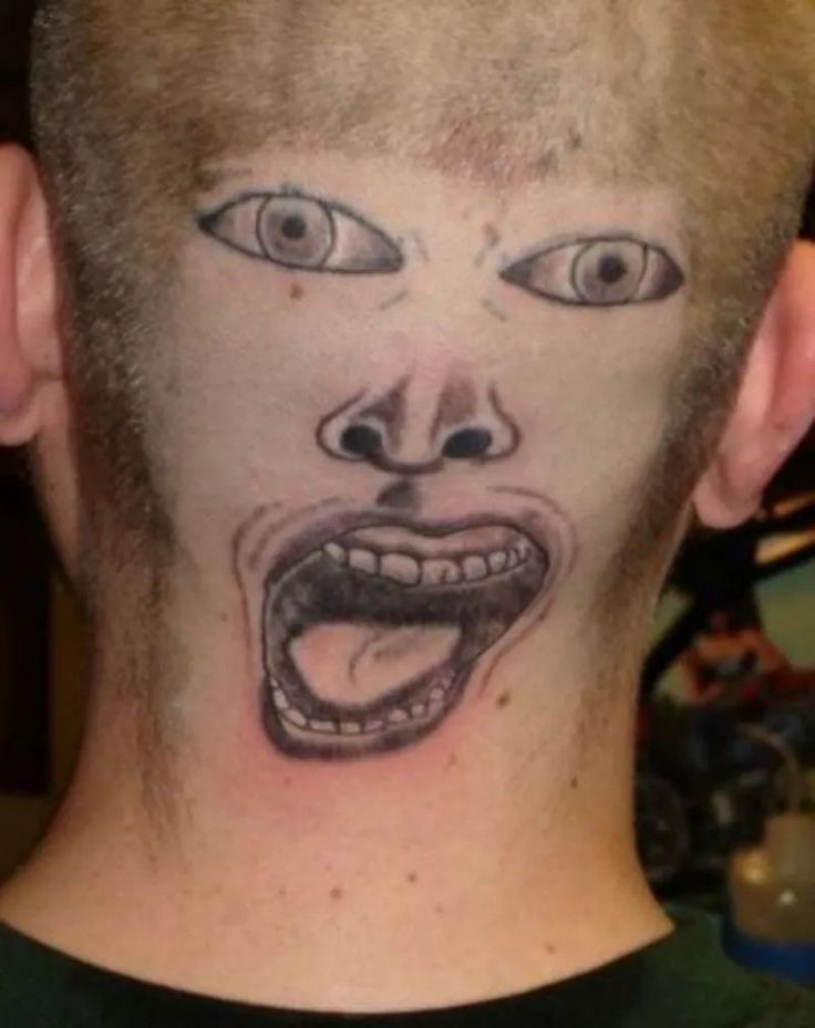 Face Tattooed on the Back of the Head