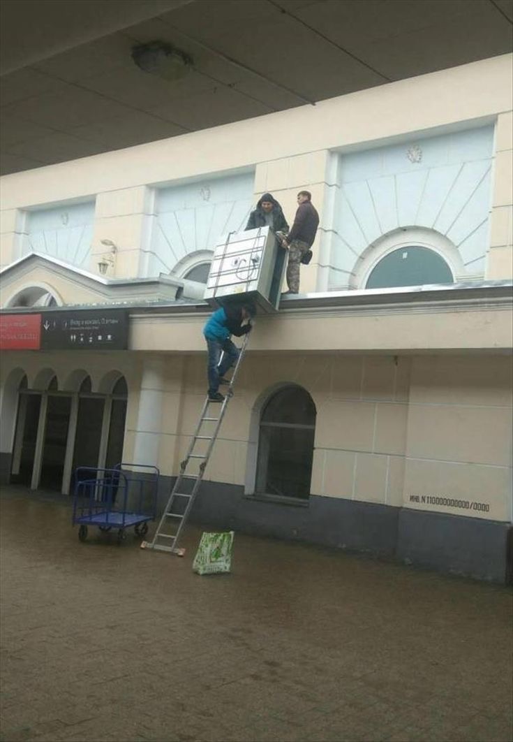 Man on Ladder Trying to Grab Something Massive