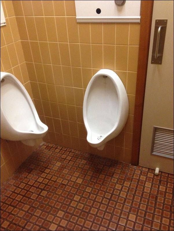 Urinals Placed Uncomfortably Close Together
