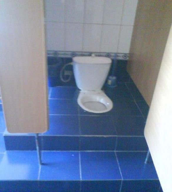 Toilet Glued to the Floor at Impossible Sitting Angle