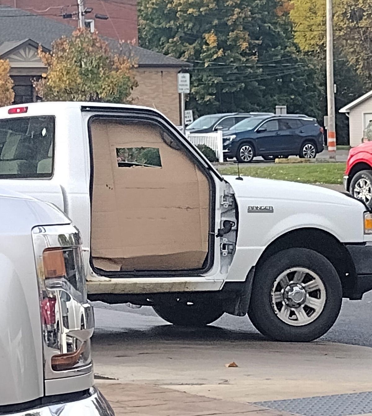 Door Replaced With a Giant Piece of Cardboard