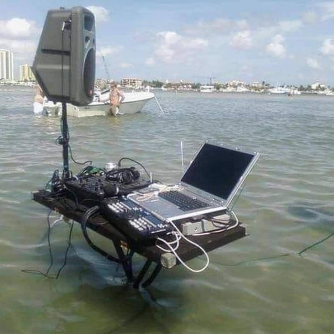 Person Sets Up an Entire DJ Rig in the Water