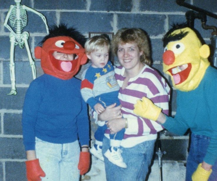Kid With Scary People in Costumes