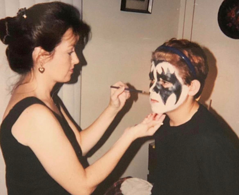 Kid Getting His Face Painted Like KISS