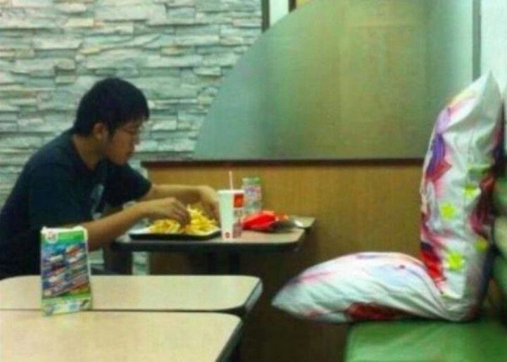 Boy at McDonald’s With a Giant Pillow